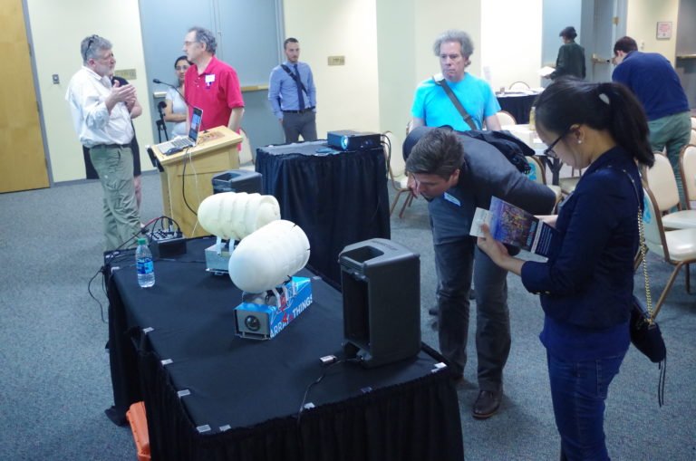 Image: Residents examine Array of Things sensing equipment